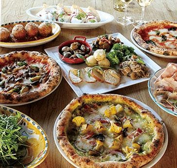 自慢のピッツァをはじめとしたボリューム満点の料理でゲストをおもてなし