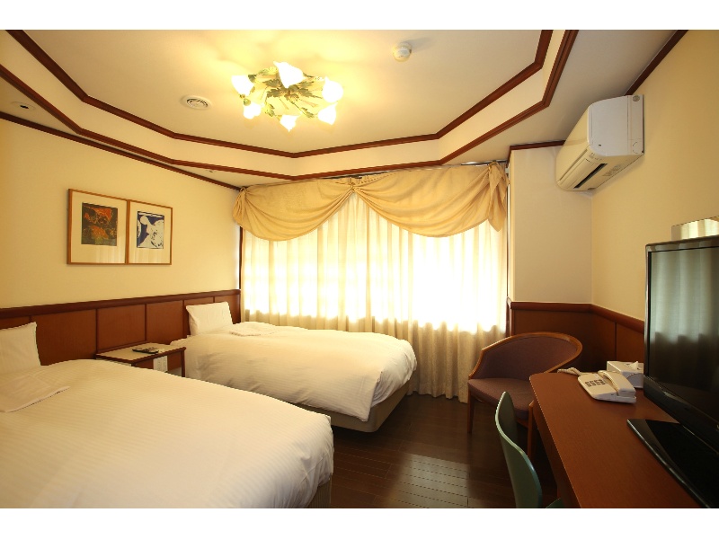 宿泊ルーム（例：ツインルーム）